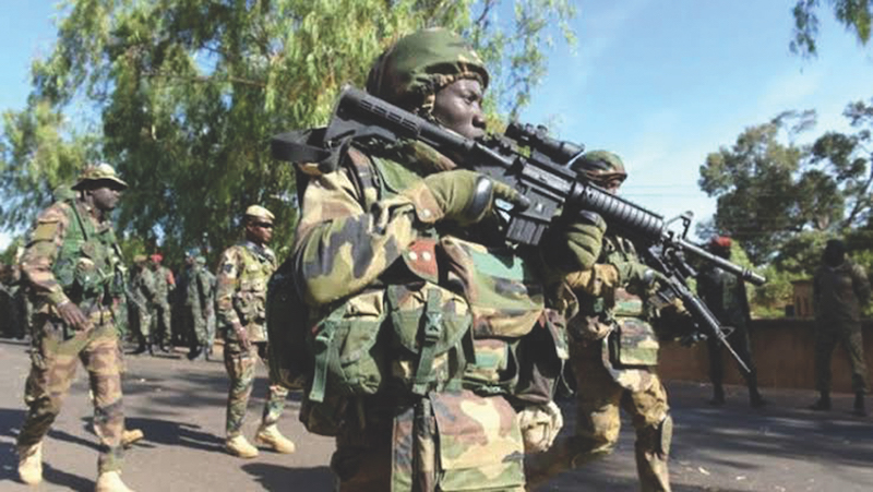 Nigerian Army Arrest Bandit in Military Uniform With Charms Heading to Oyo State