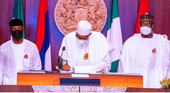 Buhari Signs 2021 Budget